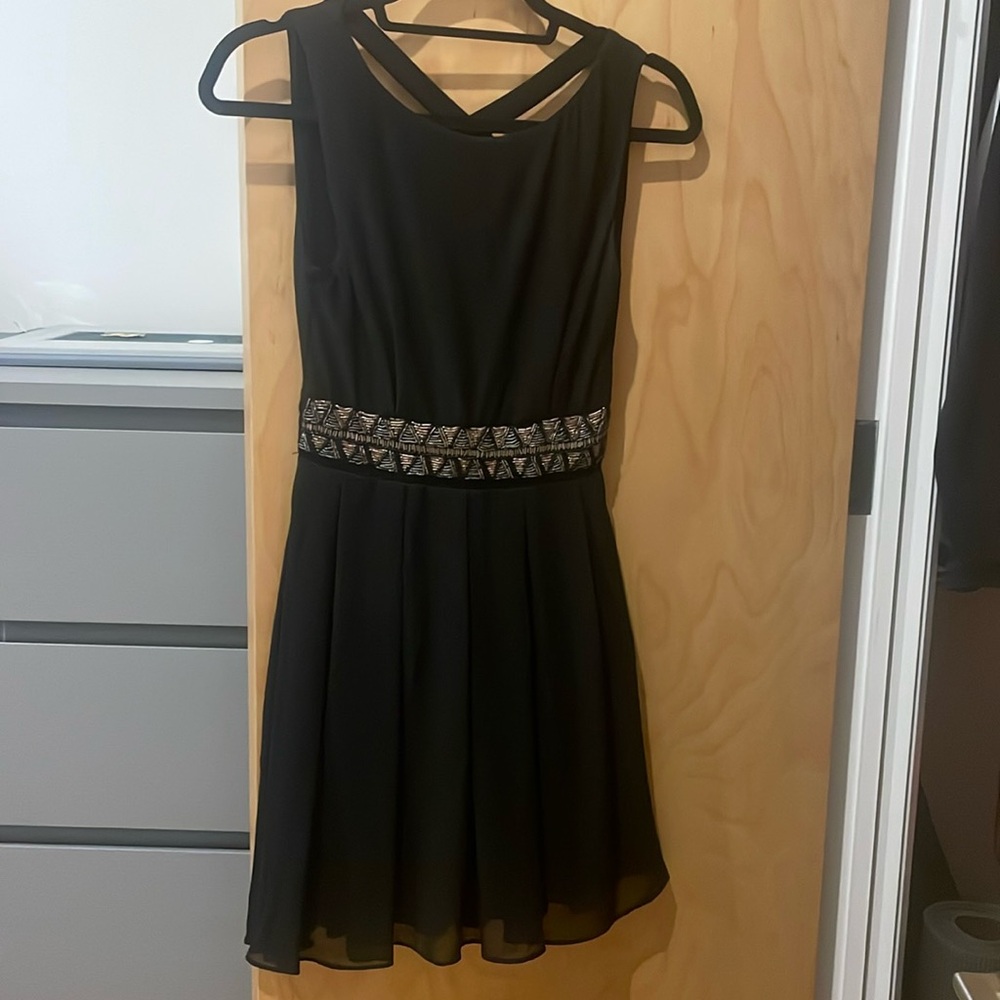 TFNC London mini black sequin dress with open cris-cross back